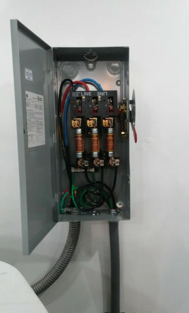 Three-phase disconnect switch installed for Smoke Detector Installation in Old Jamestown