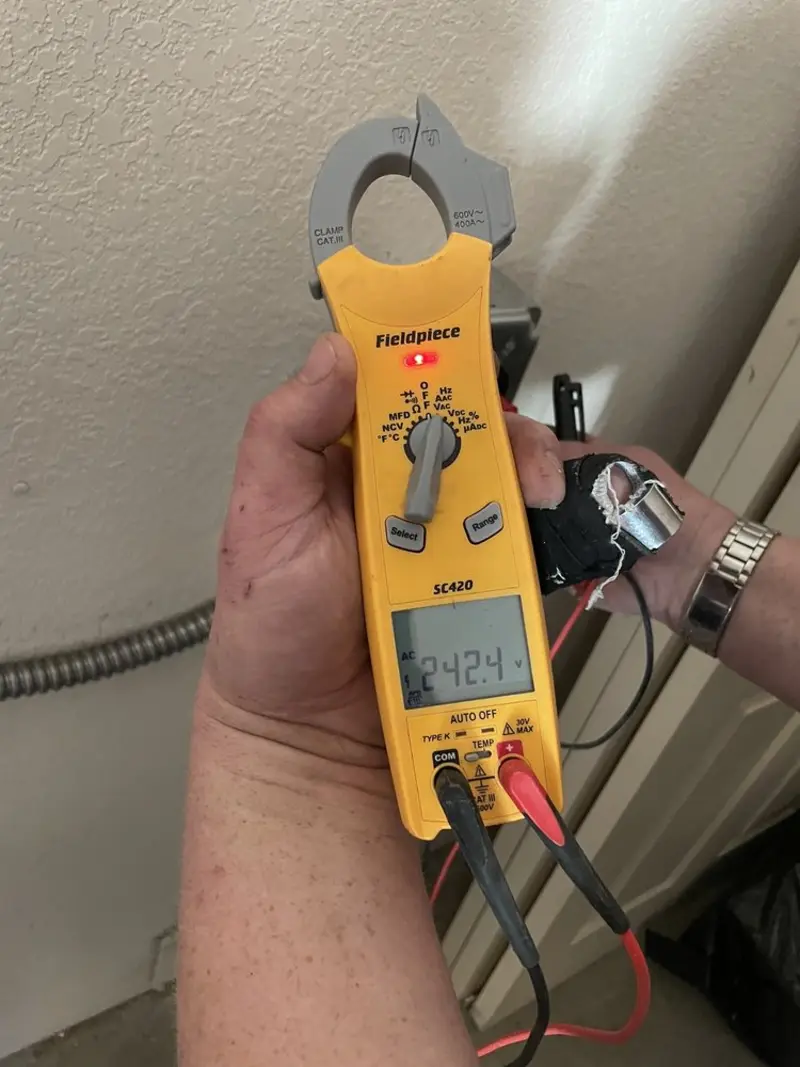 Voltage testing with clamp meter during Hot Tub / Pool Electrical Wiring in Old Jamestown